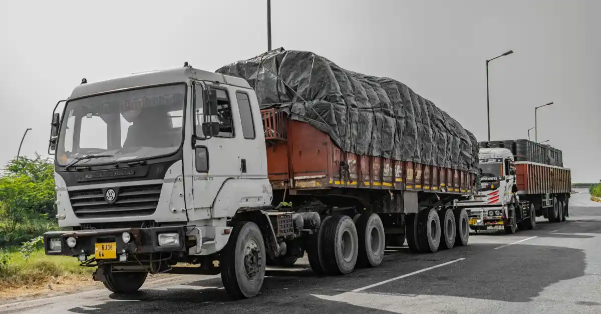 18 Wheeler Accident Attorney truck on a road, highlighting the need for legal support from an accident attorney.