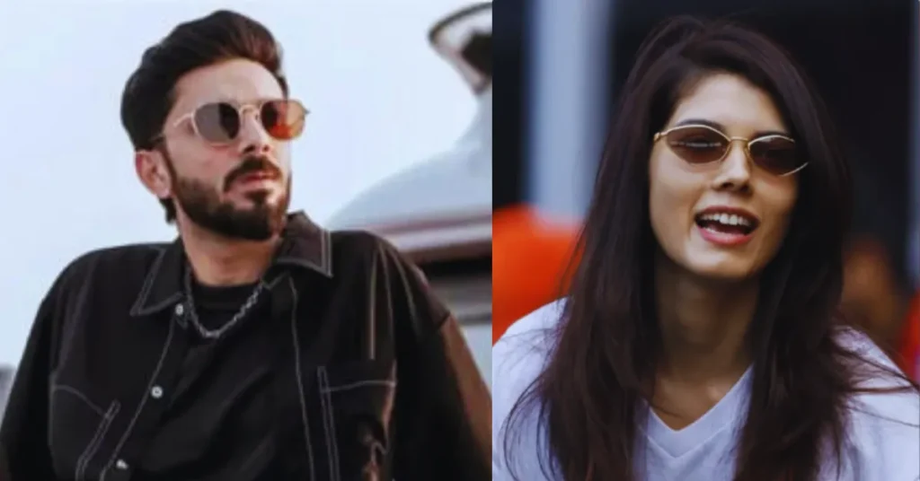Anirudh Ravichander Confronts Wedding Rumors with Kaviya Maran Anirudh Ravichander in black shirt with silver chain standing beside Kaviya Maran in white top amid wedding rumor discussions.