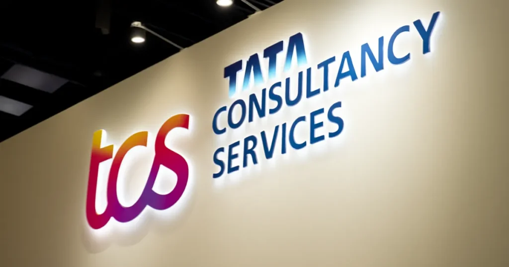 TCS Layoffs Mumbai 2025: 2% Workforce Trimmed as Company Addresses Skill Gaps and Restructuring Challenges TCS office building exterior with company logo and signage, representing the Mumbai location affected by 2% workforce reduction due to skill gaps in 2025